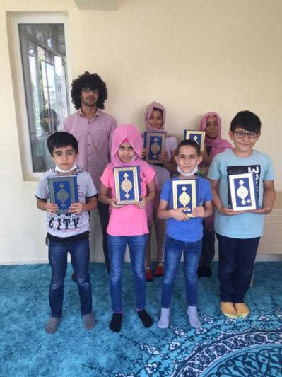 We presented a mushaf to our summer course students who had been to the Qur'an in Kayseri.