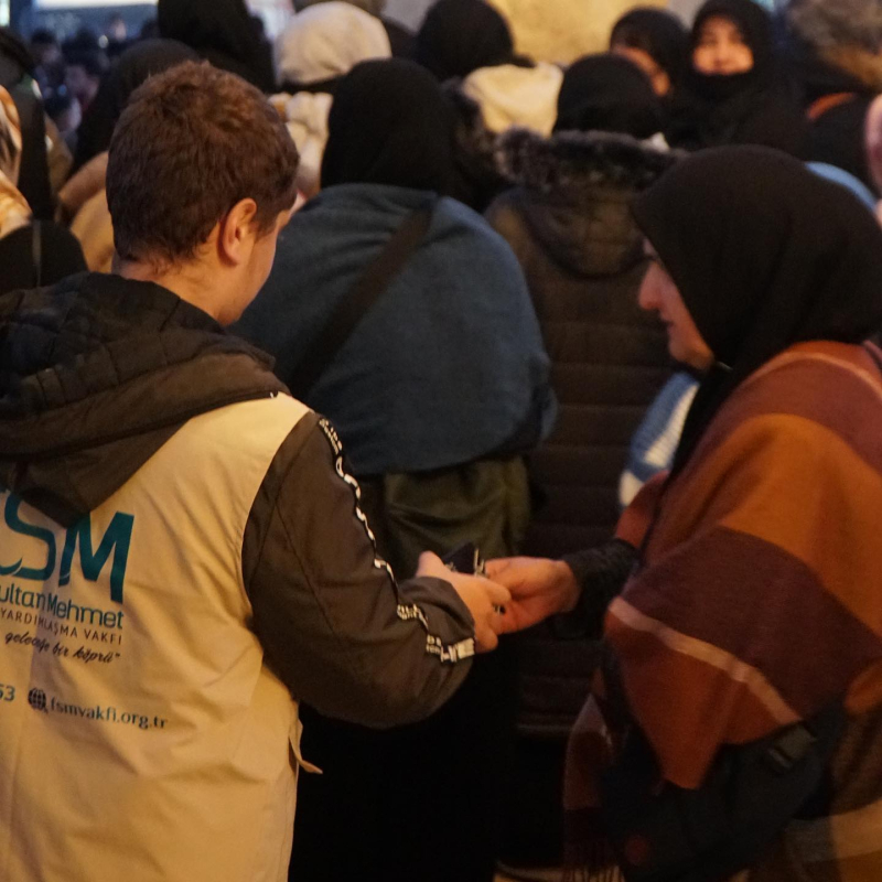 Distribution of books in Taksim Mosque.